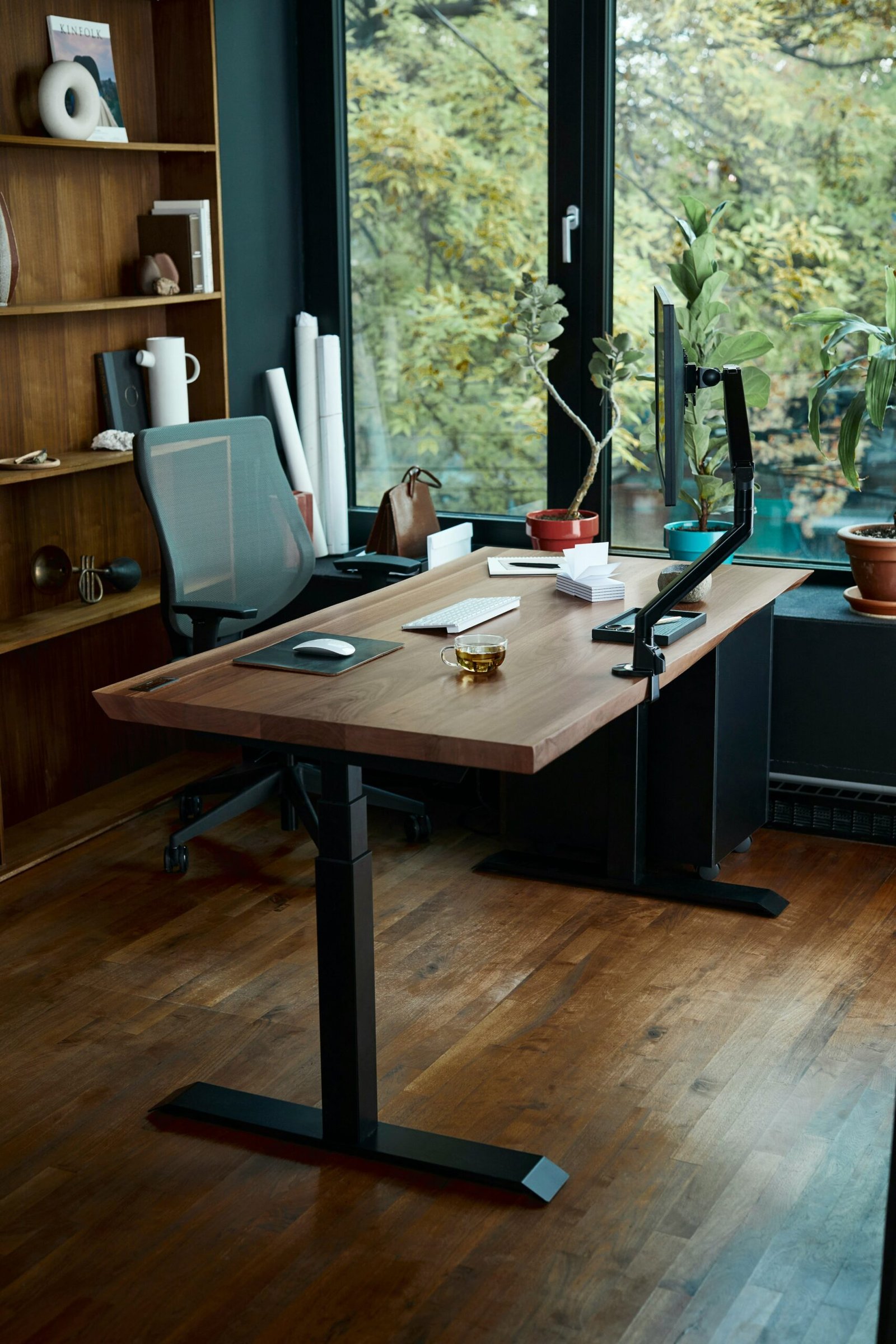 ergonomic home office setup with monitor at eye level and adjustable chair